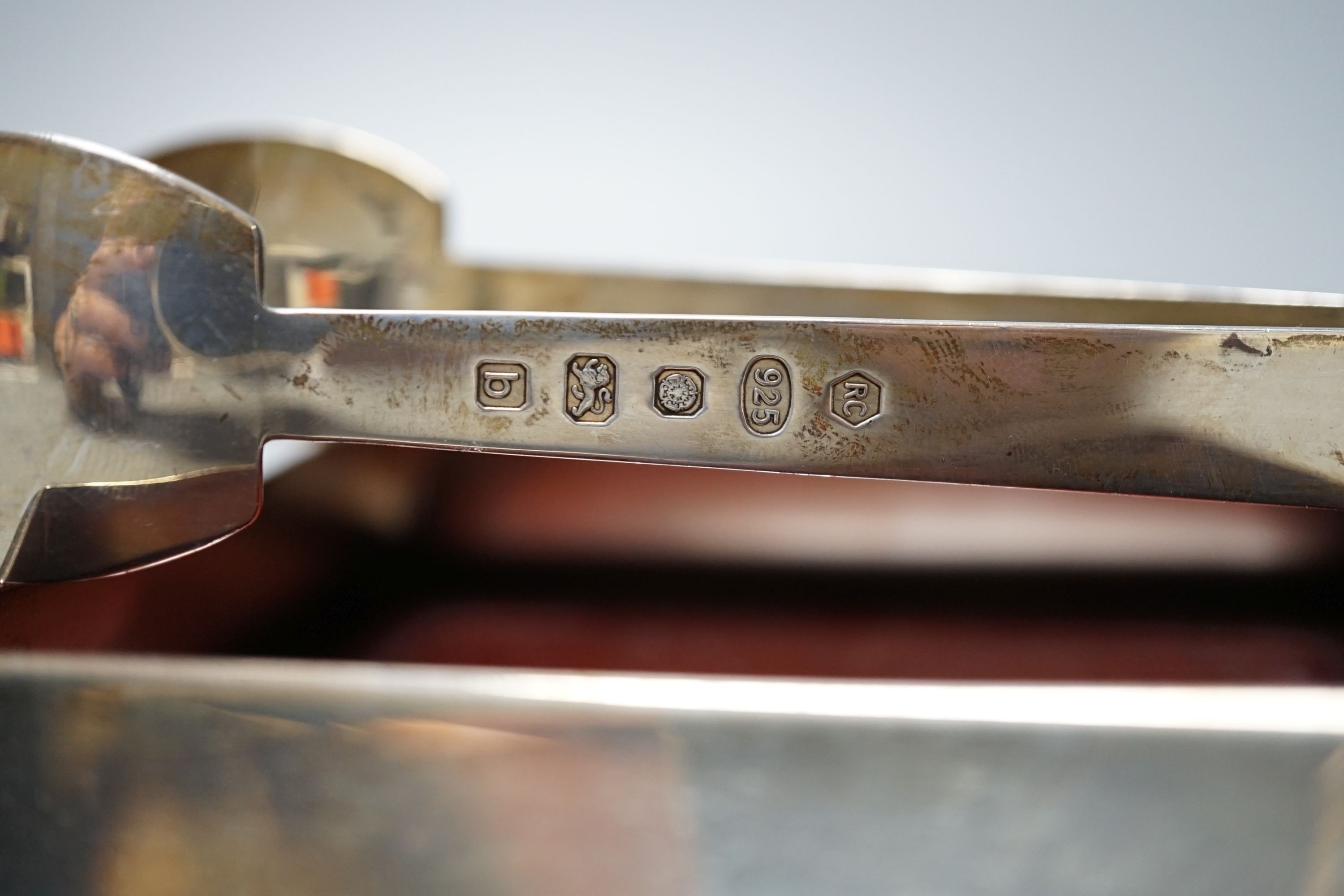 A modern silver mounted glass ice pale and matching tongs, Carrs of Sheffield, 2001, height 12.7cm, together with two modern silver mounted wooden stands.